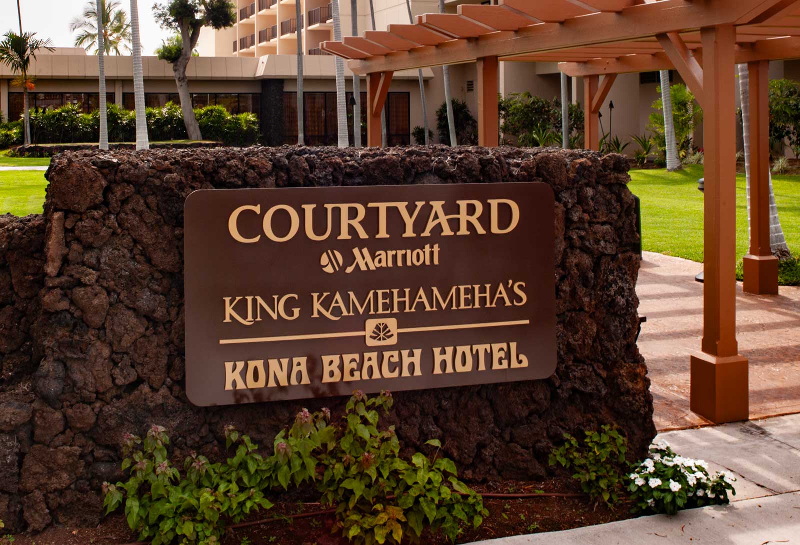  Exterior Signage | King Kahmehameha's Kona Beach Hotel | Waterjet cut brass lettering on powdercoated steel backing 
