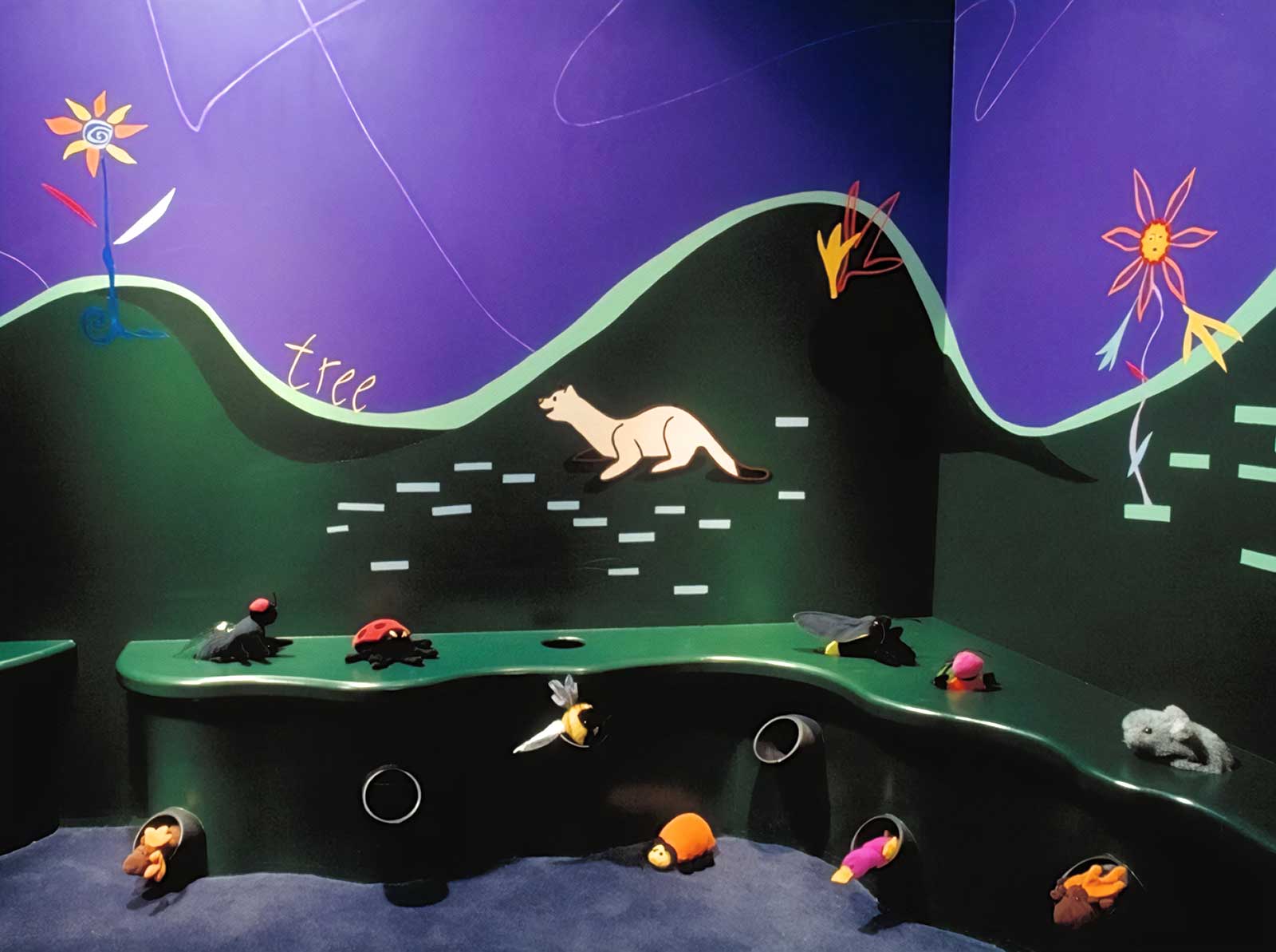  Tot Spot | Bay Area Discovery Museum | Embedded tube system designed for object-drop interaction 